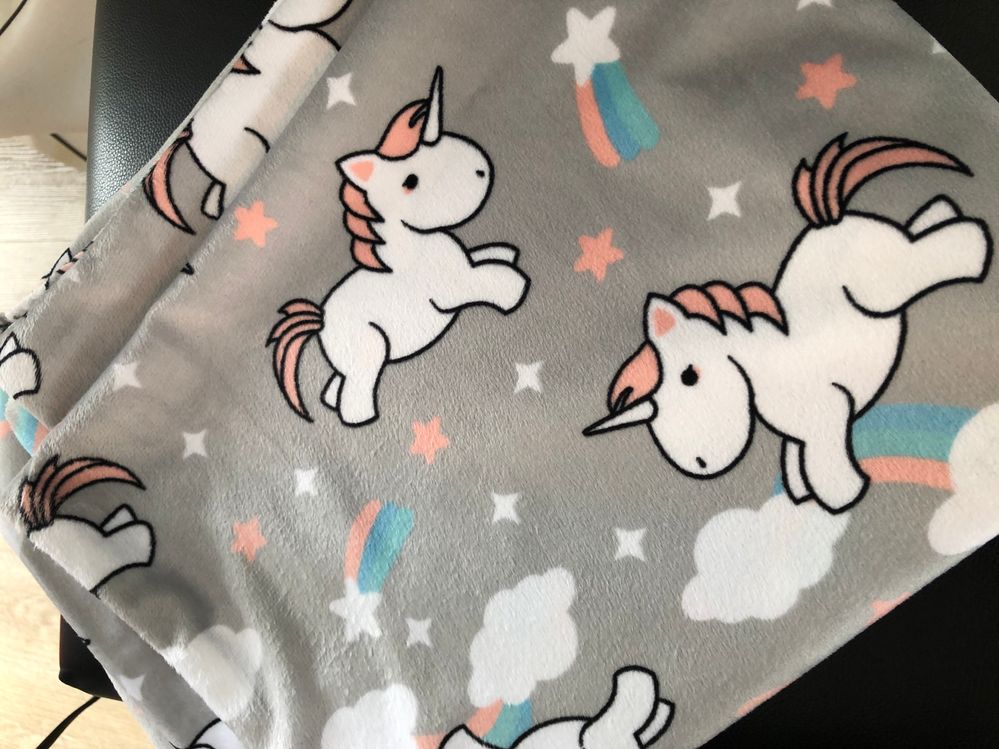 Unicorn baby blanket.