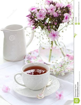 cup-tea-flowers-18523266.jpg